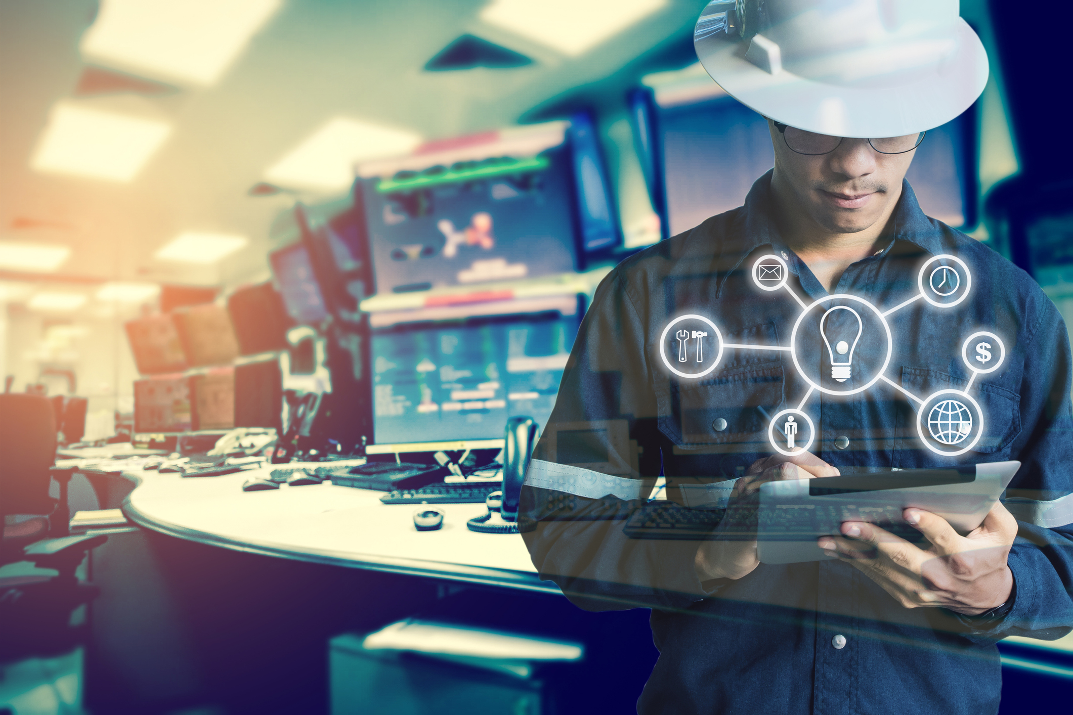 Man on tablet in workplace