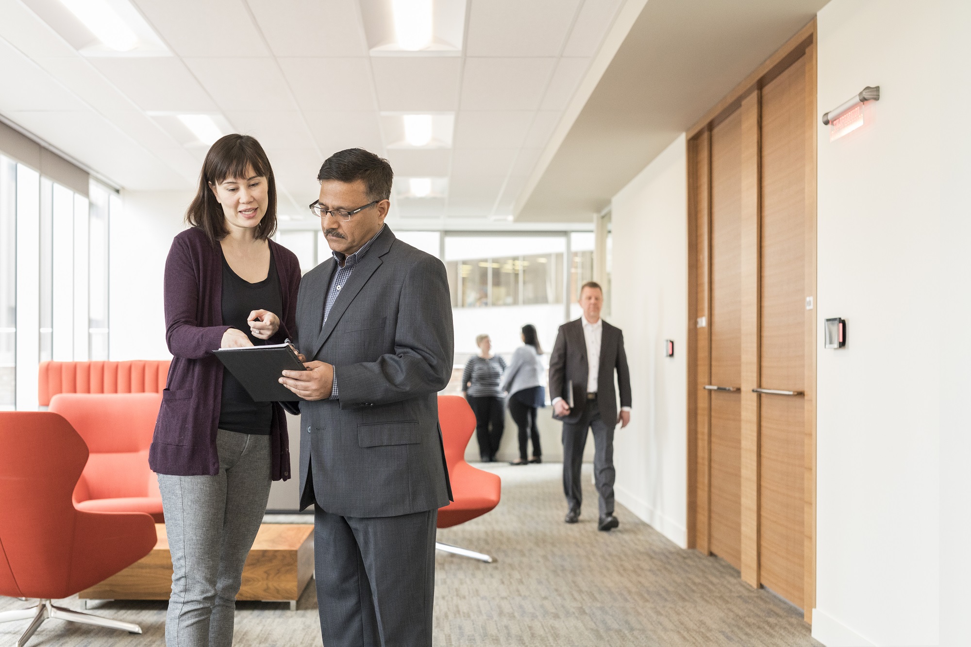 People standing in office